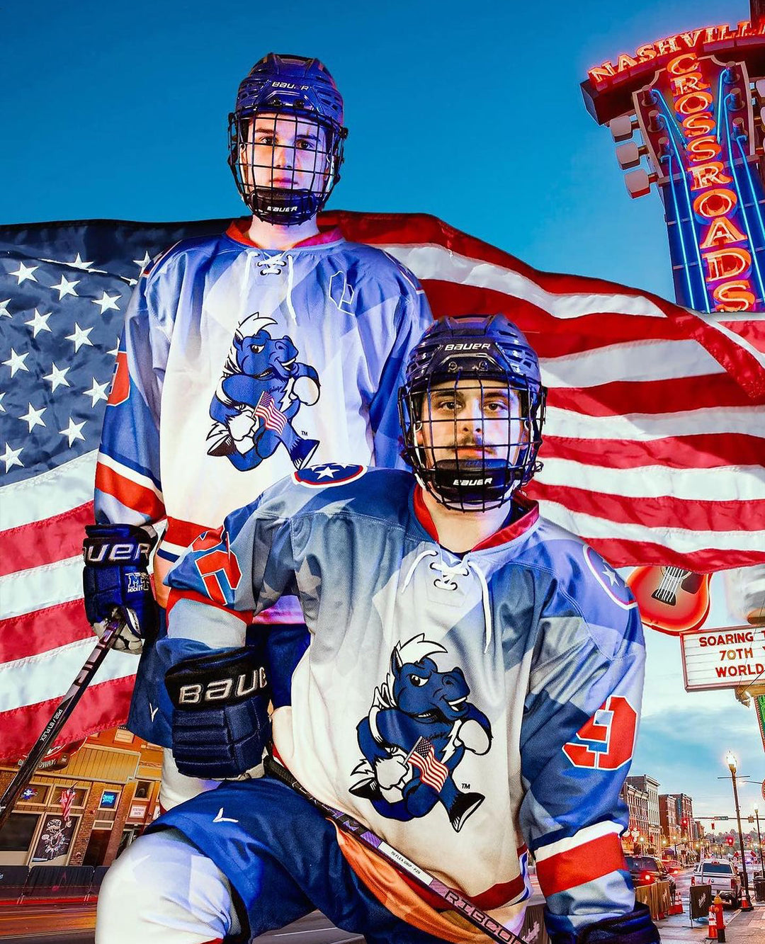 Two hockey players stand in front of an American Flag in Downtown Nashville wearing custom hockey uniforms from Verbero.